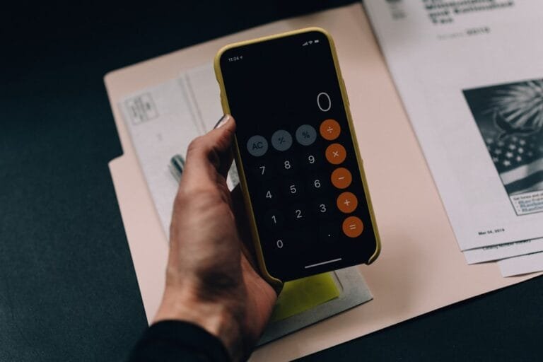 Employee financial documents and calculator representing EPF online services